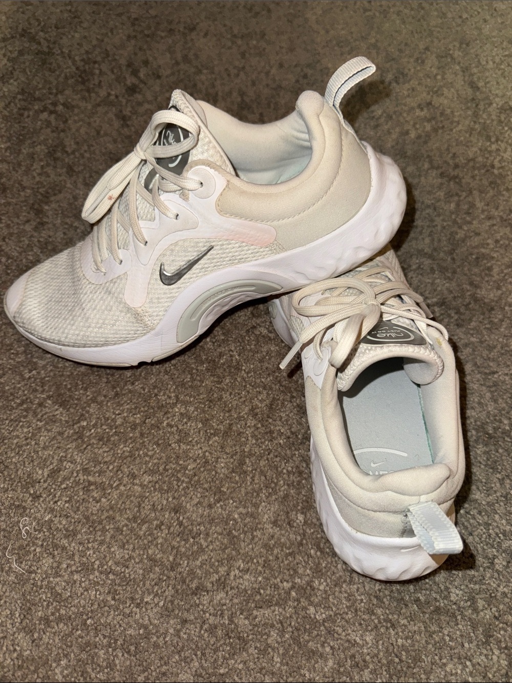 Nike Women's Cream/White Comfort Sneakers with Subtle Silver Swoosh